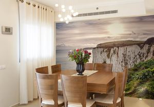 טפט קיר צילום צוק על רקע ים.