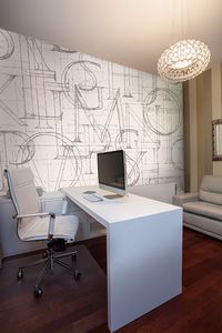 קיר איור אותיות דפוס באנגלית בגוון האפור על רקע לבן.