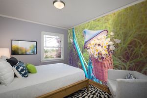 קיר צילום האופניים הצבע הטורקיז עם הפרחים הלבנים.