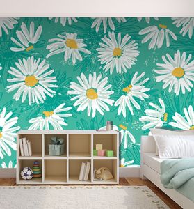 קיר הפרחים הלבנים על רקע צבע הטורקיז.