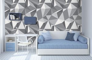 קיר גאומטרי בגווני האפור.