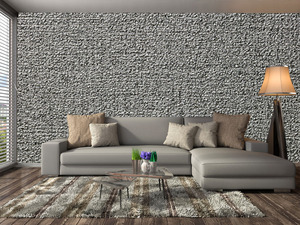 קיר בליטות הטיח באפור.