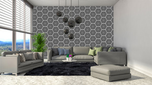 קיר המשולשים והמשושים בגוון אפור.