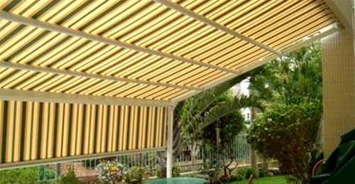 פרגולה חשמלית מדגם: סוכך מסילות קשתי הכולל שלדת אלומיניום איכותית , בד דראלון אקרילי ספרדי או PVC איכותי ומנוע מתקדם