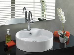 כיור רחצה מונח עגול עם חור לברז