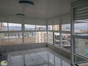 סגירת מרפסת : גג + חלונות קליל